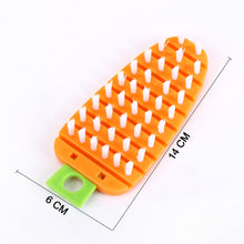 Fruit brush in a carrot shape for scrubbing produce