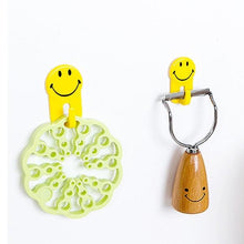 Adhesive hooks with smiley faces